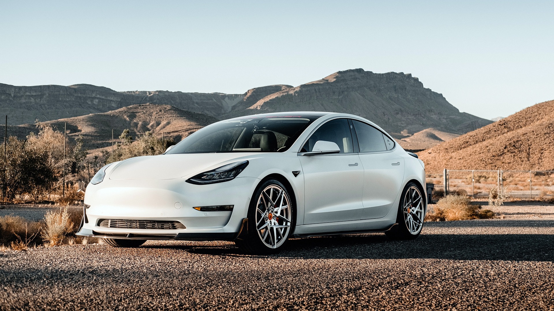 white tesla outside